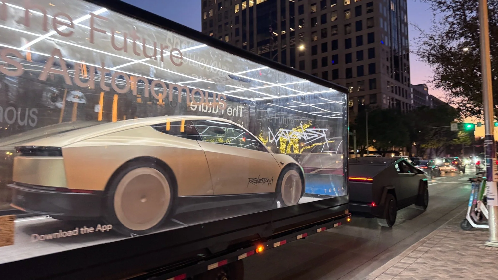 a tesla robotaxi on display in sxsw 2026