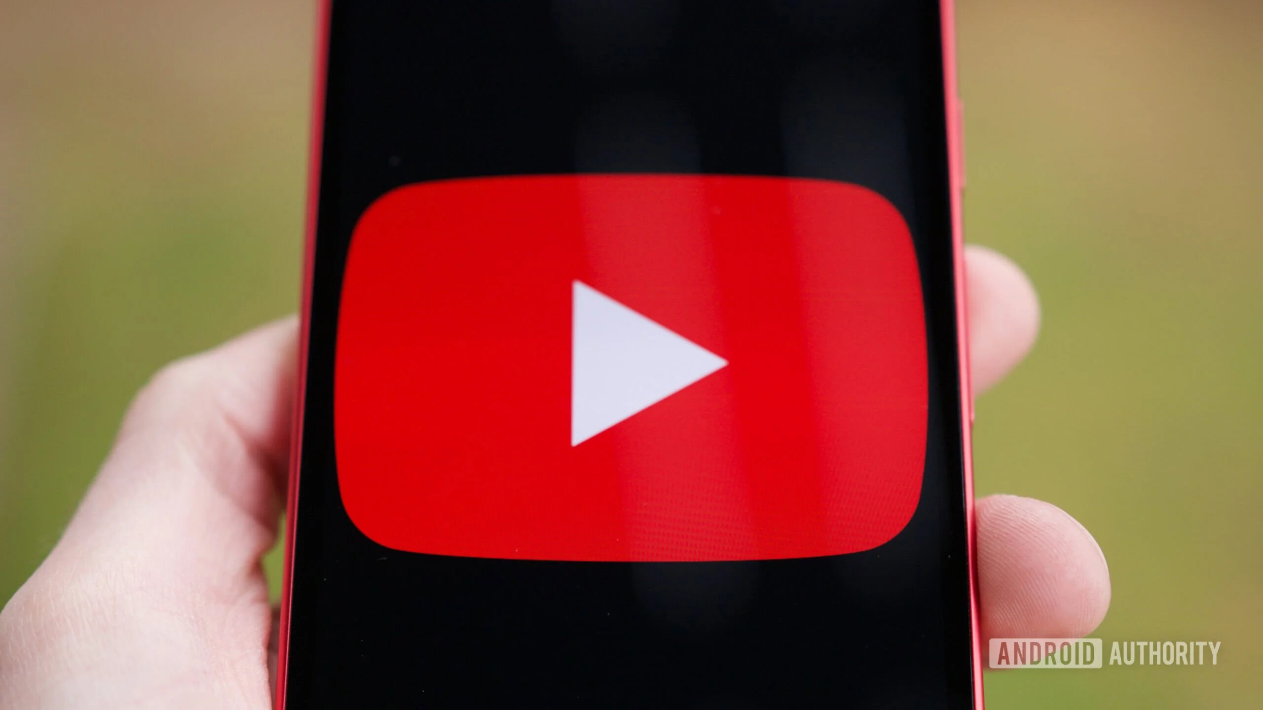 The YouTube logo displayed on a Pixel 10a.